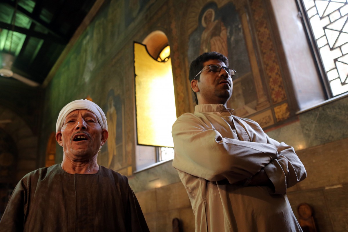 FILE PHOTO: Relatives of passangers on EgyptAir flight that went missing at sea at Saints Peter and Paul Coptic Orthodox church in Abassya district, Cairo, May  22, 2016 (EPA) 
