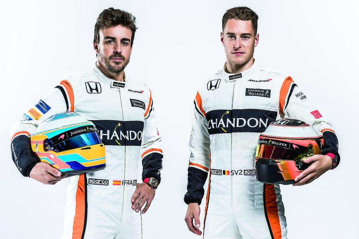 McLaren Honda driver Stoffel Vandoorne (right) and team-mate Fernando Alonso posing for a picture yesterday.