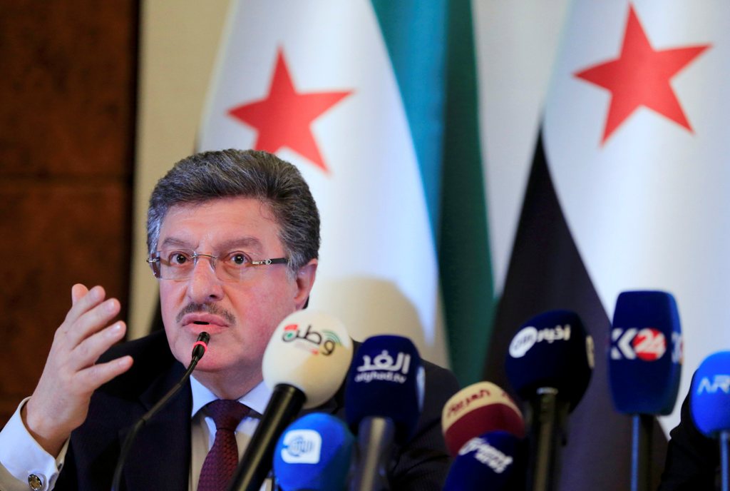 Salim al-Muslat member of the Syrian High Negotiations Committee (HNC) opposition group addresses the media aside of the Intra-Syria peace talks in Geneva, Switzerland, February 25, 2017. REUTERS/Pierre Albouy
