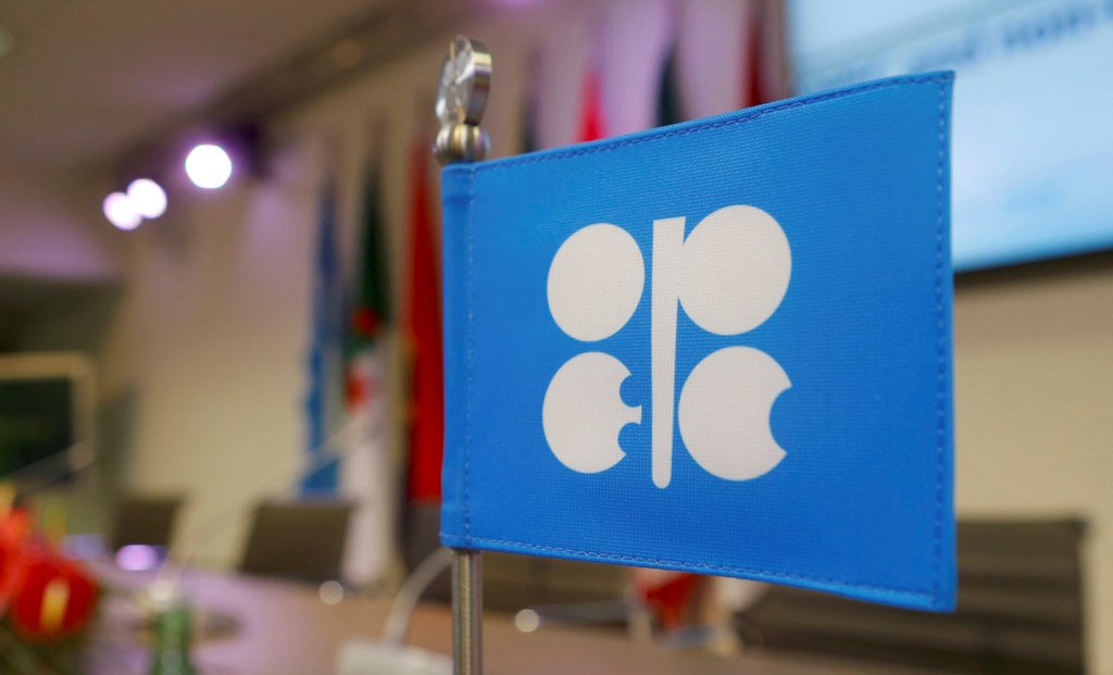 FILE PHOTO - A flag with the Organization of the Petroleum Exporting Countries (OPEC) logo is seen before a news conference at OPEC's headquarters in Vienna, Austria, December 10, 2016. REUTERS/Heinz-Peter Bader/File Photo
