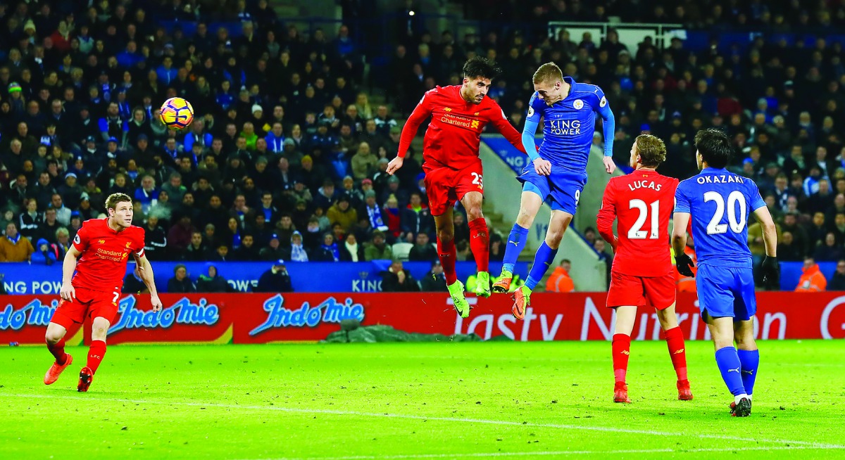 Leicester City's Jamie Vardy (third left) scores their third goal against Liverpool during their Premier League match played at King Power Stadium on Monday.