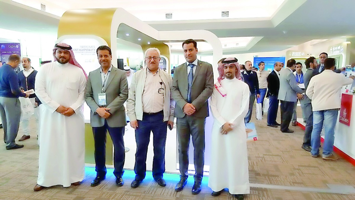 Gulf Air officials pose for a group photo at Saudi Aramco's worldwide headquarters in Dhahran.