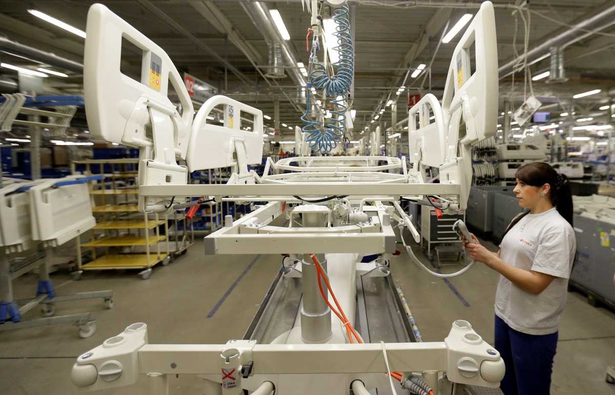 A worker assembles a hospital bed in Linet factory in Slany, Czech Republic, February 7, 2017. Picture taken February 7, 2017. REUTERS/David W Cerny