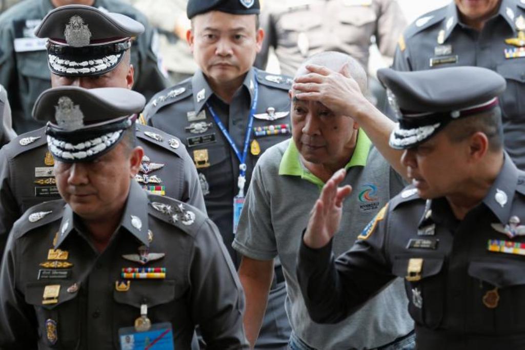 Police General Jumpol Manmai, who was fired after being accused by government for misconduct and political interests which were detrimental to national security, arrives at a court in Bangkok, Thailand March 2, 2017. REUTERS/Chaiwat Subprasom.
