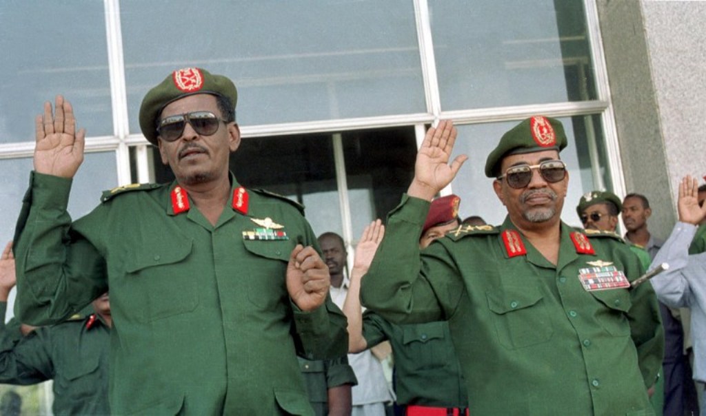 (L) Bakri Hassan Saleh. President Omar al-Bashir(R)