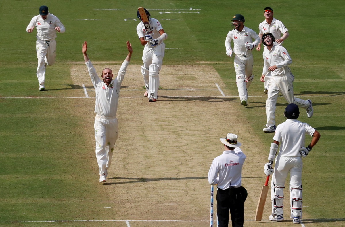 Australia's Nathan Lyon celebrates the wicket of India's Ishant Sharma with his teammates. (REUTERS/Danish Siddiqui)