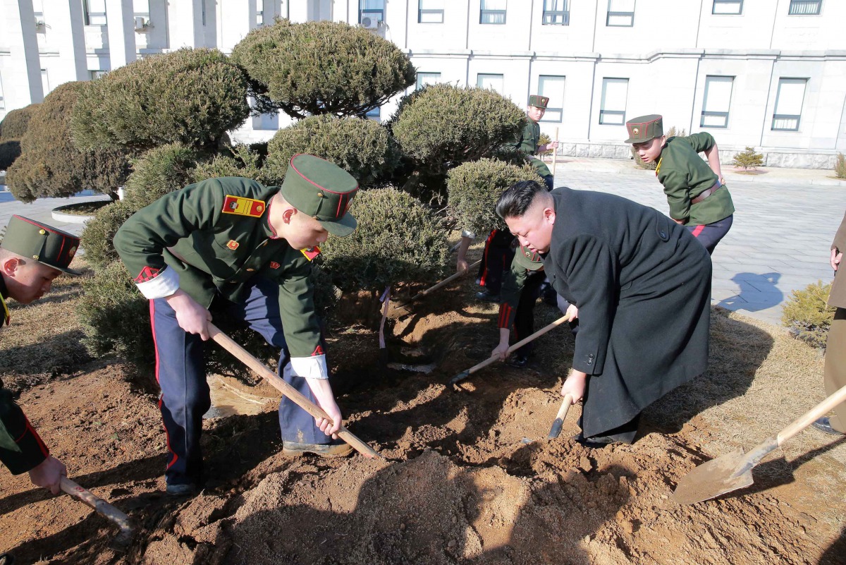 North Korean leader Kim Jong Un visited Mangyongdae Revolutionary School and planted trees with its students on Thursday, the Tree-planting Day, in this undated photo released by North Korea's Korean Central News Agency (KCNA) in Pyongyang March 3, 2017. 