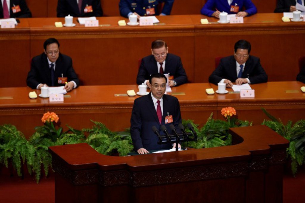 Chinese Premier Li Keqiang delivers his report during the opening session of the National People’s Congress, China’s legislature, in Beijing’s Great Hall of the People on March 5, 2017. / AFP PHOTO / WANG ZHAO.