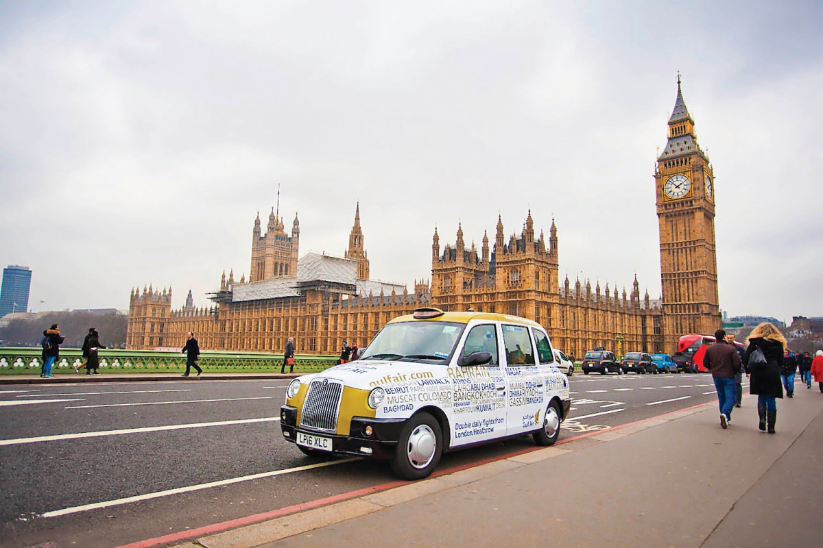 A London Cab adorned with Gulf Air brand.