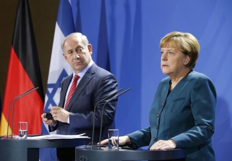 Israeli Prime Minister Benjamin Netanyahu and German Chancellor Angela Merkel hold a joint news conference at the Chancellery in Berlin, Germany October 21, 2015. REUTERS/Guido Bergmann