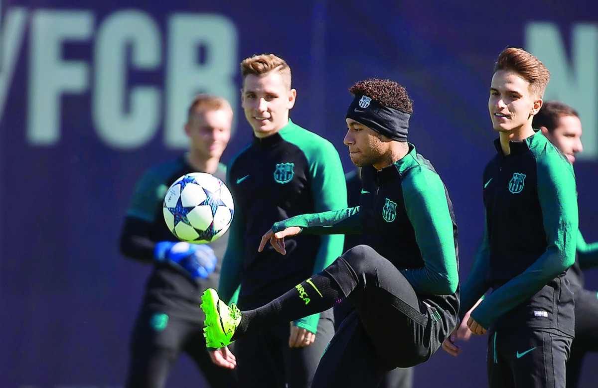 Barcelona's Neymar kicks the ball during training session on the eve of team's Champions League last 16 (second leg) clash against PSG, at Sant Joan Despi, outside Barcelona, yesterday. 