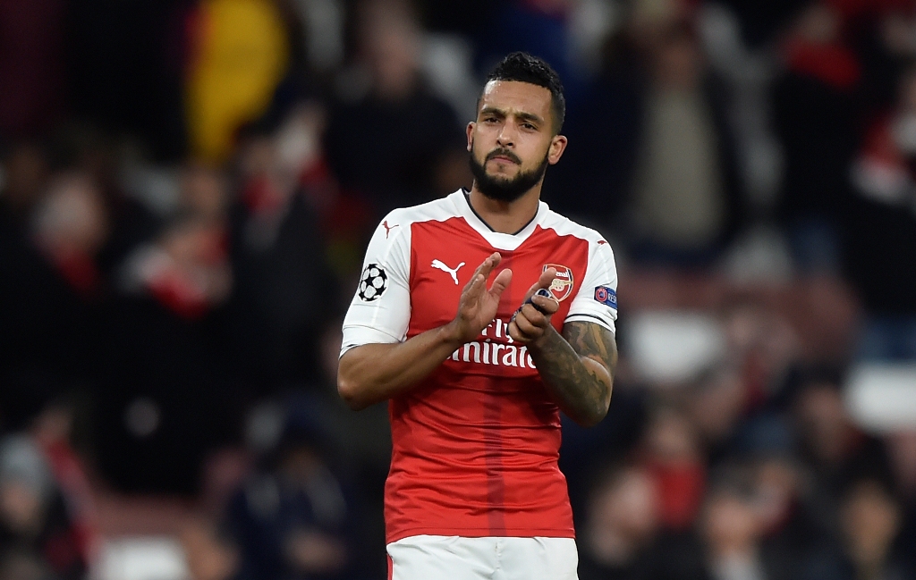 Arsenal's Theo Walcott applauds fans after the game. Reuters / Hannah McKay
