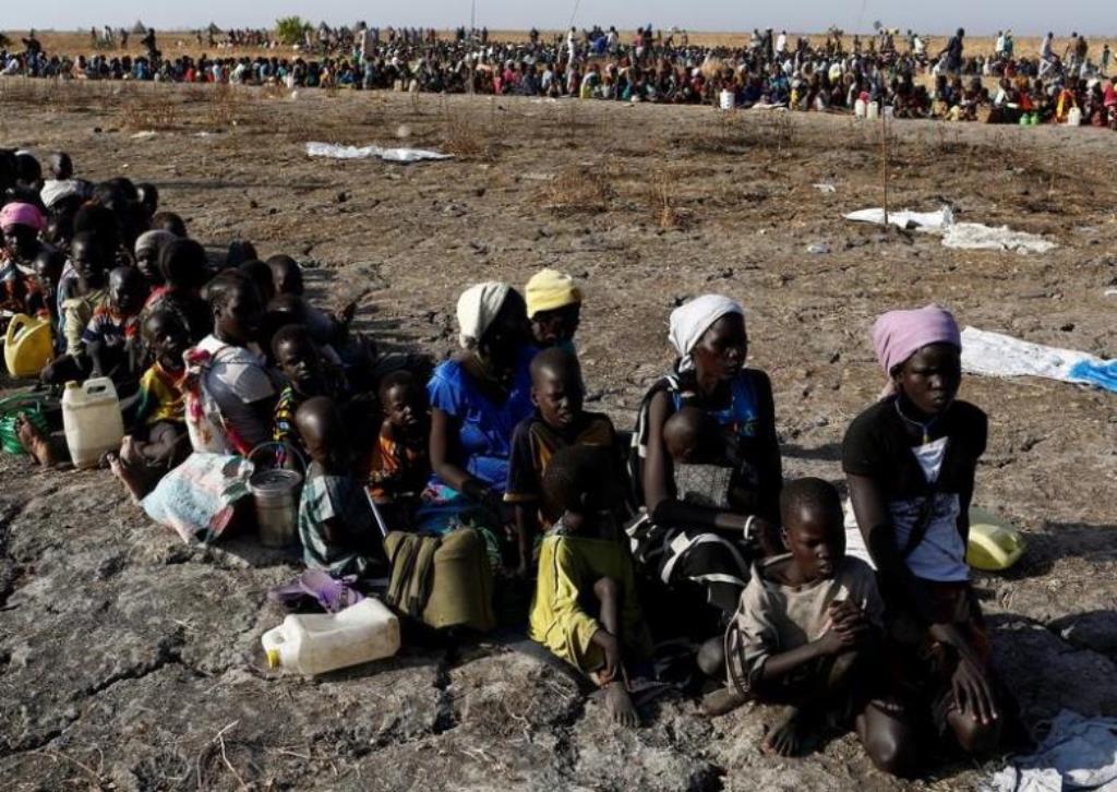 Women and children wait to be registered prior to a food distribution carried out by the United Nations World Food Programme (WFP) in Thonyor, Leer state, South Sudan. Reuters/Siegfried Modola
