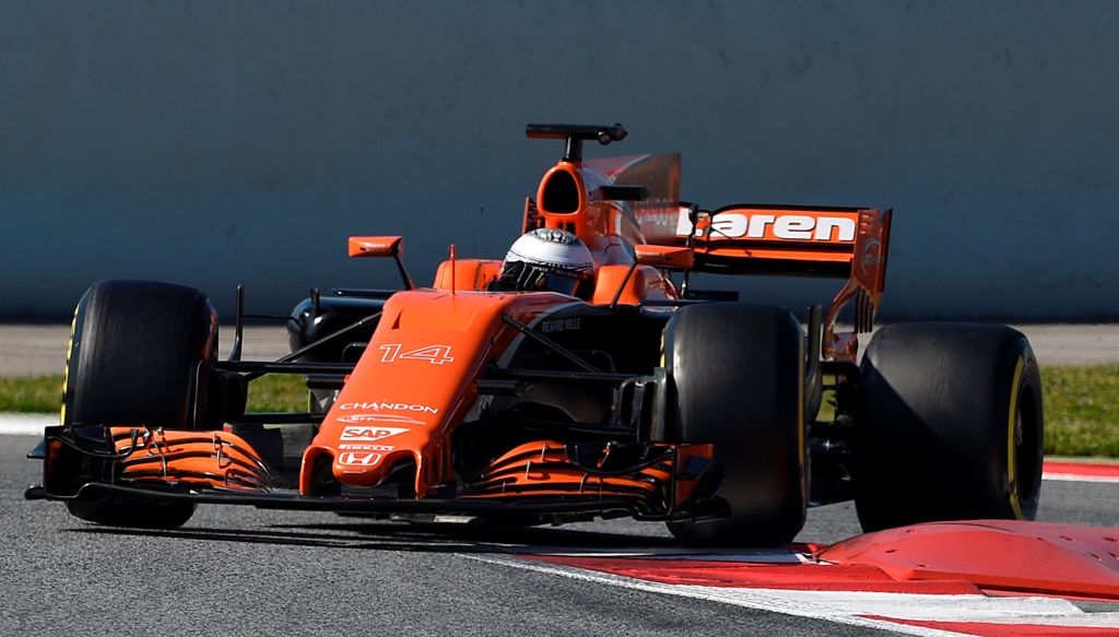 McLaren's Spanish driver Fernando Alonso drives at the Circuit de Catalunya on March 10, 2017 in Montmelo on the outskirts of Barcelona on the fourth day of the second week of tests ahead of the Formula One Grand Prix season. / AFP / LLUIS GENE
