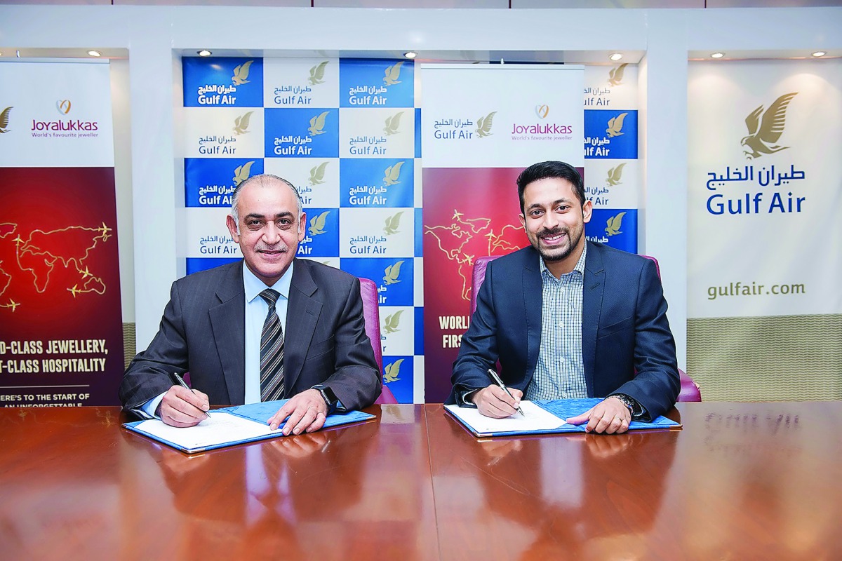 Officials of Joyalukkas and Gulf Air during the event.