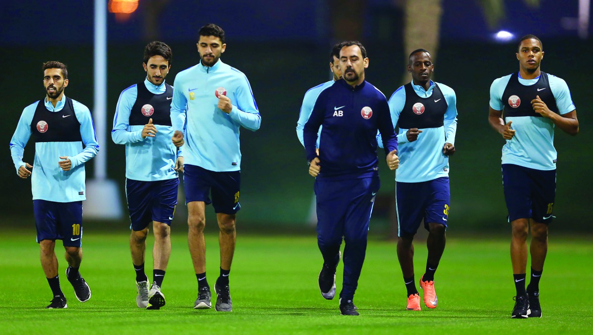 Qatar national team players take part in a training session under the watchful eyes of coach Jorge Fossati in Doha yesterday. Qatar is preparing for the upcoming two matches of the 2018 FIFA World Cup qualifiers against Iran and Uzbekistan. Qatar will tak
