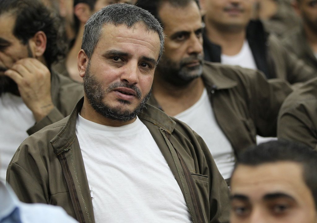 Ahmed Daqamseh, a Jordanian soldier convicted of killing seven Israeli schoolgirls on March 13, 1997, is seen at Um Alluol prison in the city of Mafraq, Jordan, August 7, 2012. Picture taken August 7, 2012. REUTERS/Muhammad Hamed 