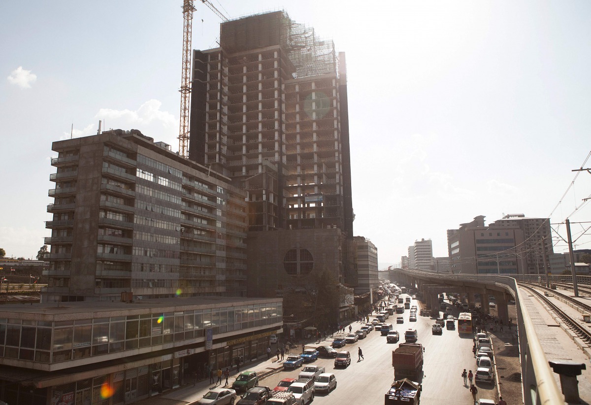 This file photo taken on April 3, 2015 shows view due west from the Meskel Square station of the Addis Ababa light rail. Electric light railway tracks soar over Ethiopia's capital, a rare example of mass transit infrastructure on a continent ruled by rams
