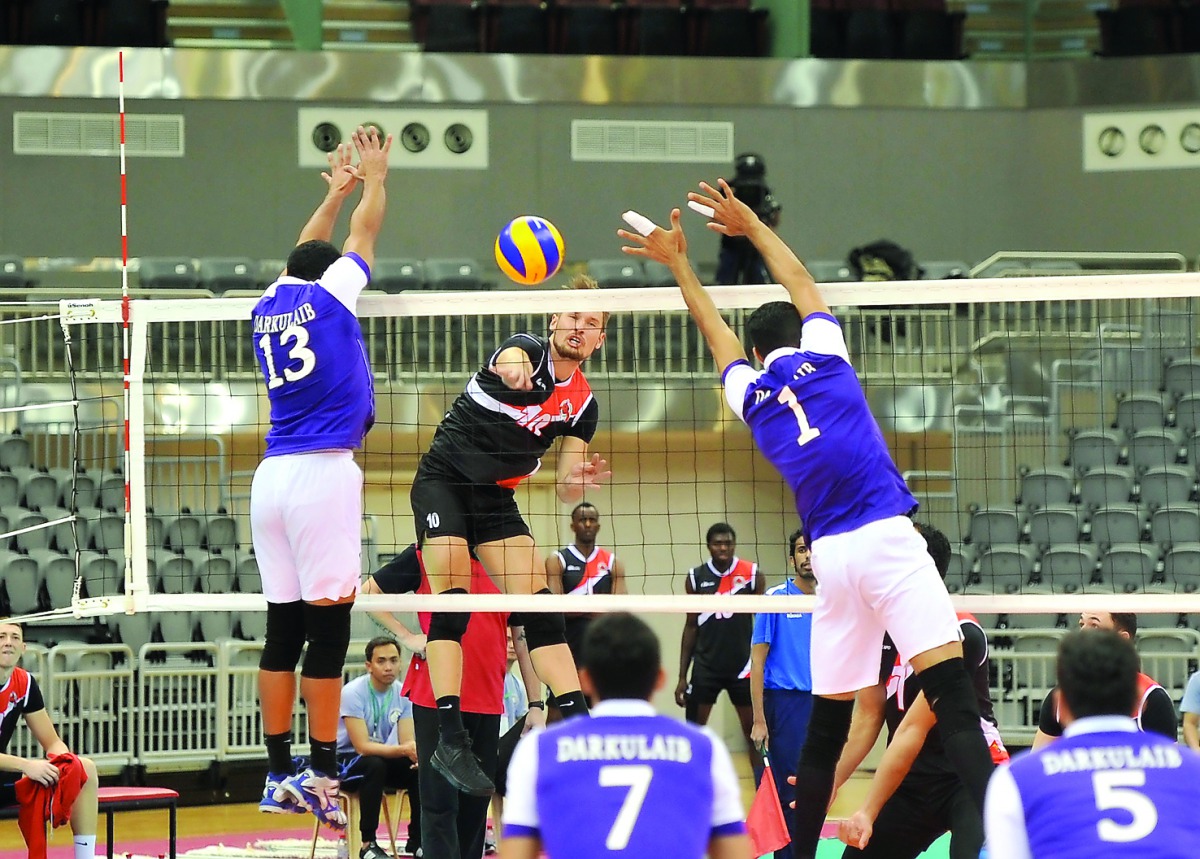Action during the 36th GCC Club Volleyball Championship match between Al Rayyan and Dar Kulaib (Bahrain) at Ali bin Hamad SC Al Attiyah Arena yesterday. Pics: Abdul Basit/The Peninsula
