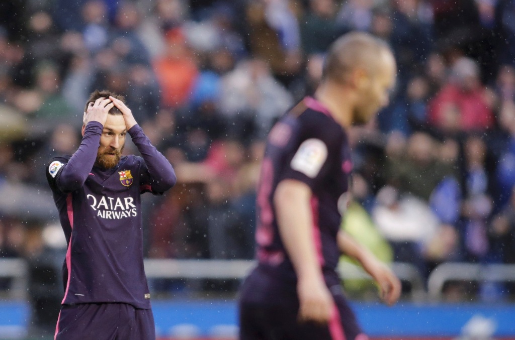 Barcelona's Lionel Messi reacts during the match. REUTERS/Miguel Vidal
