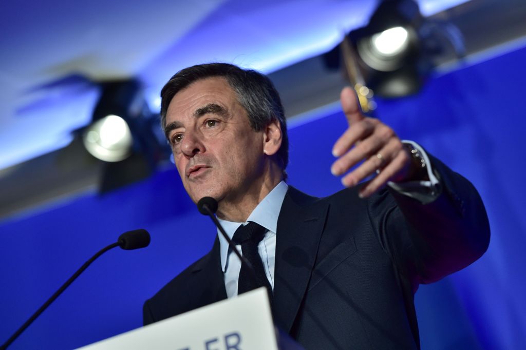 French presidential election candidate for the right-wing Les Republicains (LR) party Francois Fillon speaks during a press conference on his programme on March 13, 2017 at his campaign headquarters in Paris. / AFP / CHRISTOPHE ARCHAMBAULT
