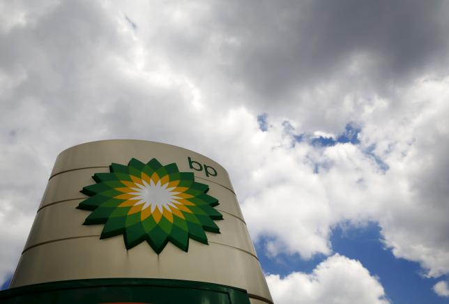 Signage for a BP petrol station is pictured in London in this file picture taken July 29, 2014 (Reuters / Luke MacGregor) 