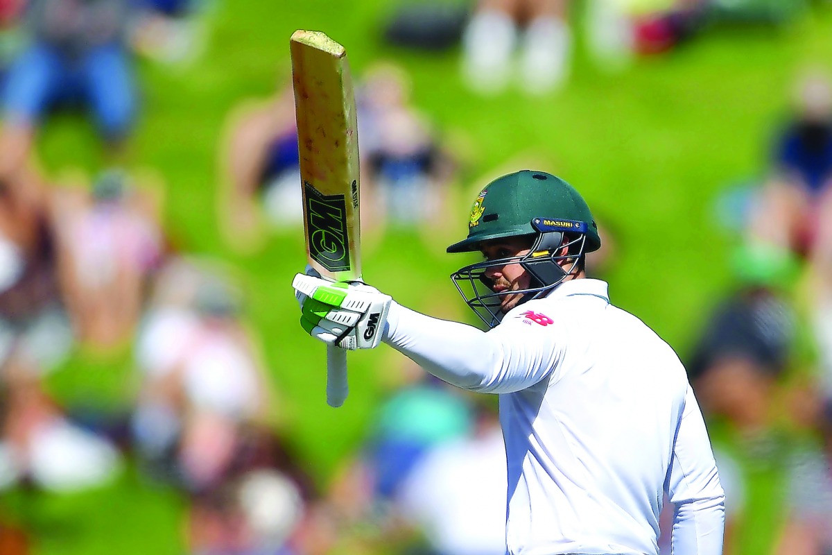 South Africa's Quinton de Kock celebrates after scoring 50 runs during day two of the second Test cricket match against New Zealand at the Basin Reserve in Wellington.