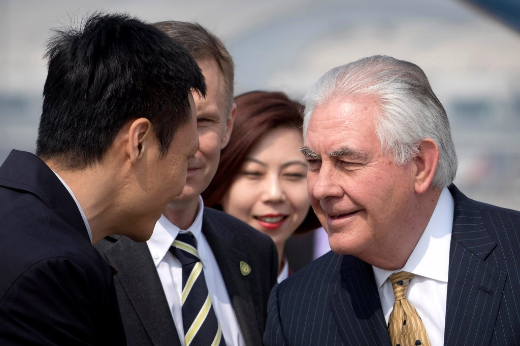 US Secretary of State Rex Tillerson (R) is greeted as he arrives at Beijing Capital International Airport in Beijing, China, Saturday, March 18, 2017. REUTERS/Mark Schiefelbein/Pool
