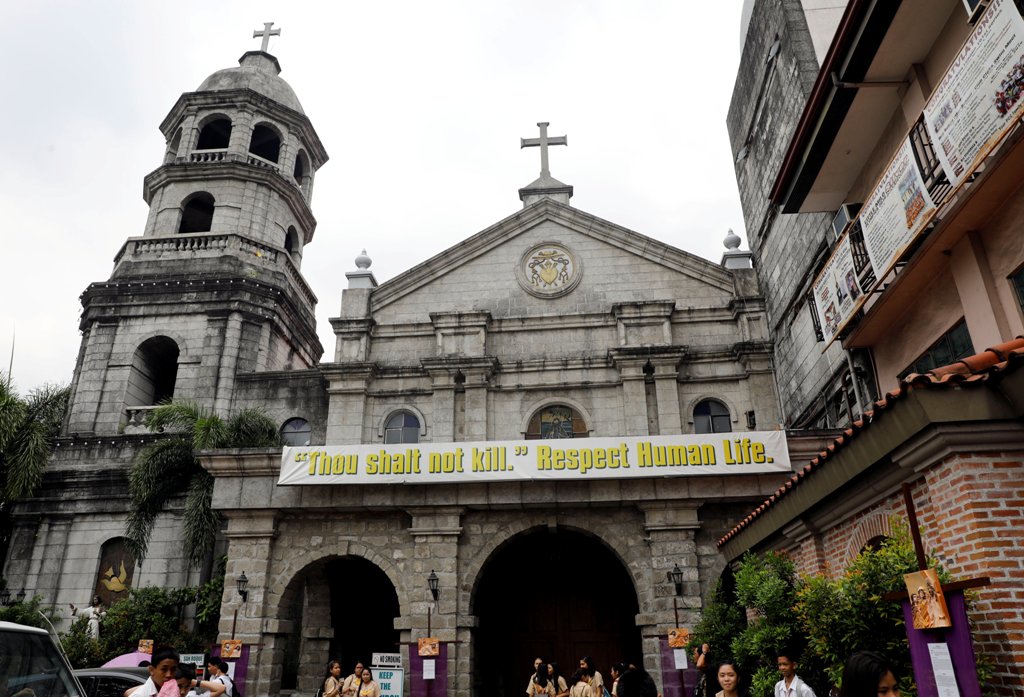 A banner hangs outside a church in the Philippine town of Pateros, Metro Manila, Philippines March 15, 2017. Picture taken March 15, 2017. REUTERS/Erik De Castro
