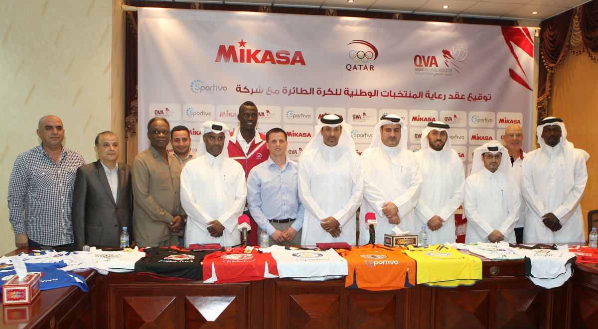Qatar Volleyball QVA president Ali Ghanim al-Kuwari and Sportivo CEO Uros Stanic  and others after signing the Qatar national team’s kits sponsorship agreement at the QVA headquarters. Sportivo will supply Mikasa playing kits to the Qatar senior, junior, 