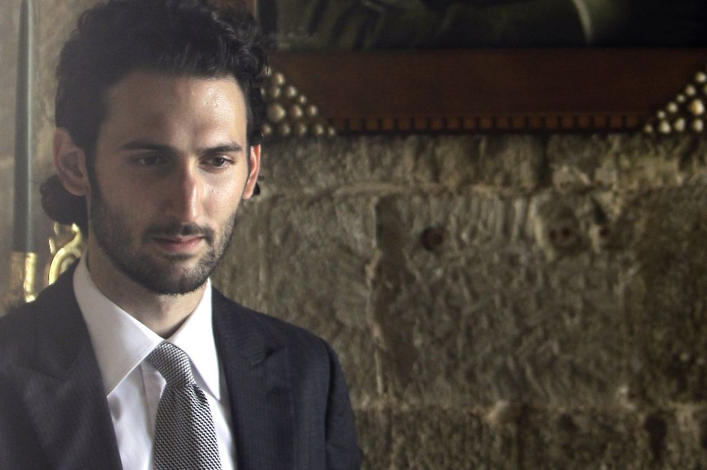 (FILES) This file photo taken on July 24, 2010 shows Taymur Jumblatt, son of Lebanese Druze leader Walid Jumblatt, walking past a painting of his late grandfather Kamal Jumblatt during a farewell lunch for an Israeli-Arab Druze delegation at Jumblatt's re