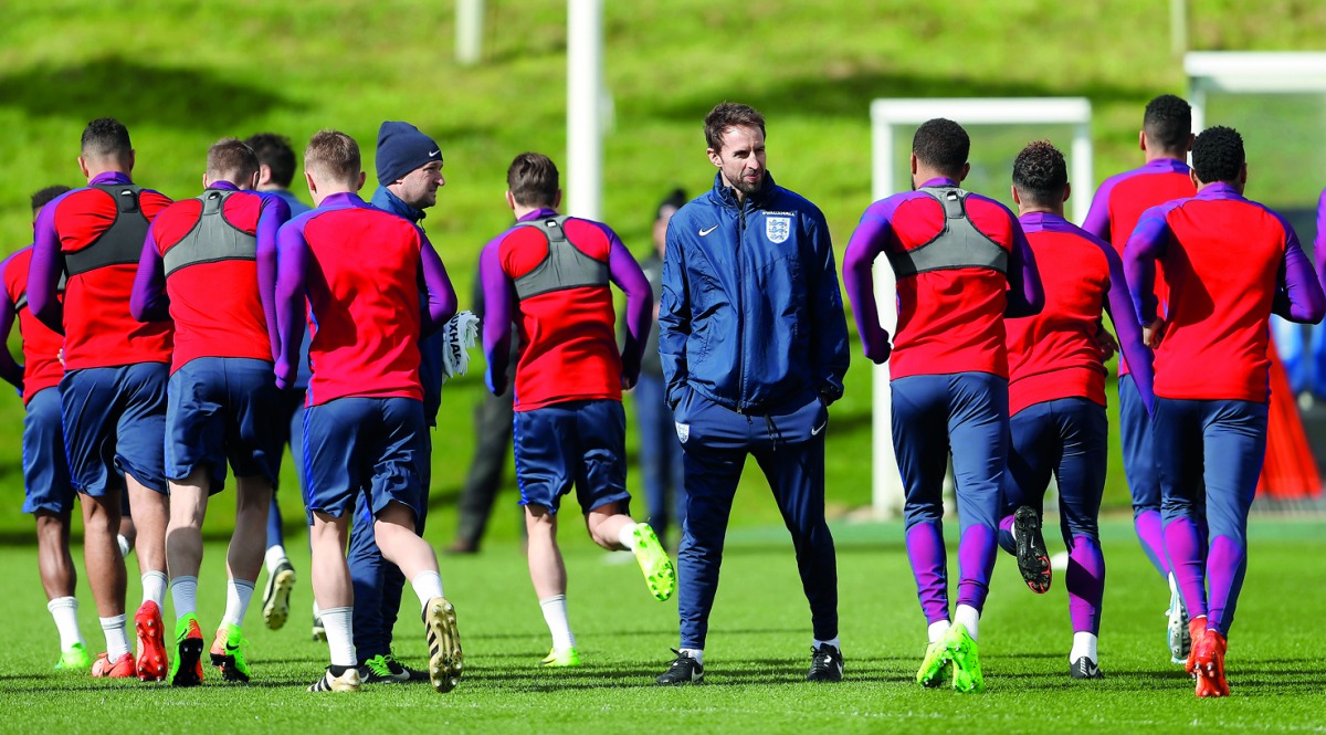England manager Gareth Southgate (centre) observed during a training session.