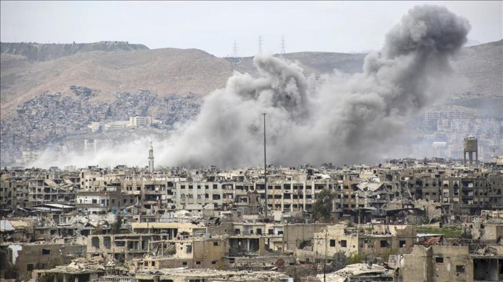 DAMASCUS, SYRIA - MARCH 21: Smoke rises after the war crafts belonging to the Assad regime forces carried out airstrikes on the opposition-controlled areas in the Jobar neighborhood of Damascus, Syria on March 21, 2017. ( Ammar Süleyman - Anadolu Agency )