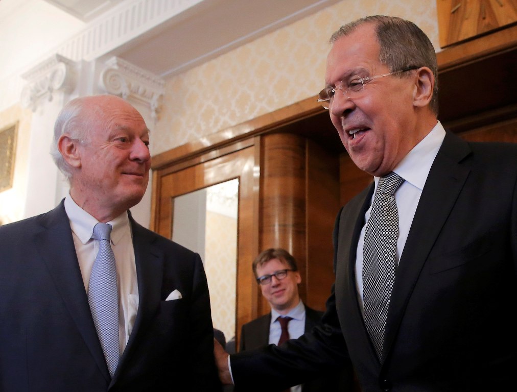 Russia's Foreign Minister Sergei Lavrov (R) and United Nations' Special Envoy for Syria Staffan de Mistura react during a meeting in Moscow, Russia, March 22, 2017. REUTERS/Maxim Shemetov
