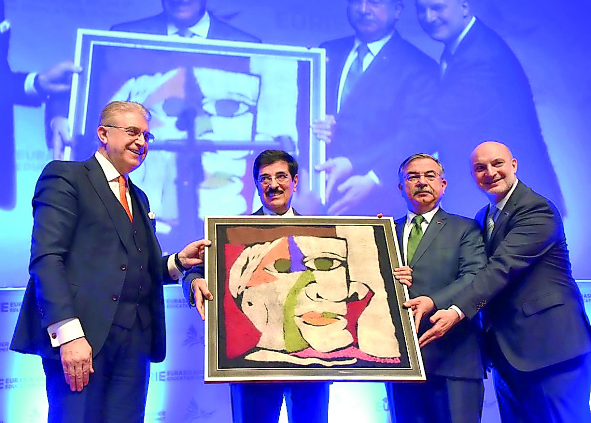 H E Dr Hamad bin Abdulaziz Al Kawari being honoured by officials at the Eurasia Higher Education Summit in Istanbul.