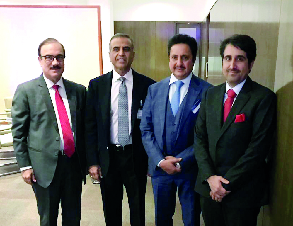 Sheikh Khalifa bin Jassim Al Thani (second right), Chairman of Qatar Chamber; Qatar Chamber Director General Saleh bin Hamad Al Sharqi (first right) and other officials during the event.