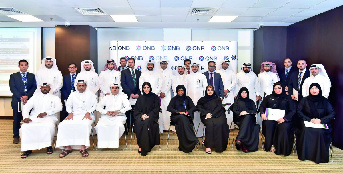 QNB officials and employees at the event.