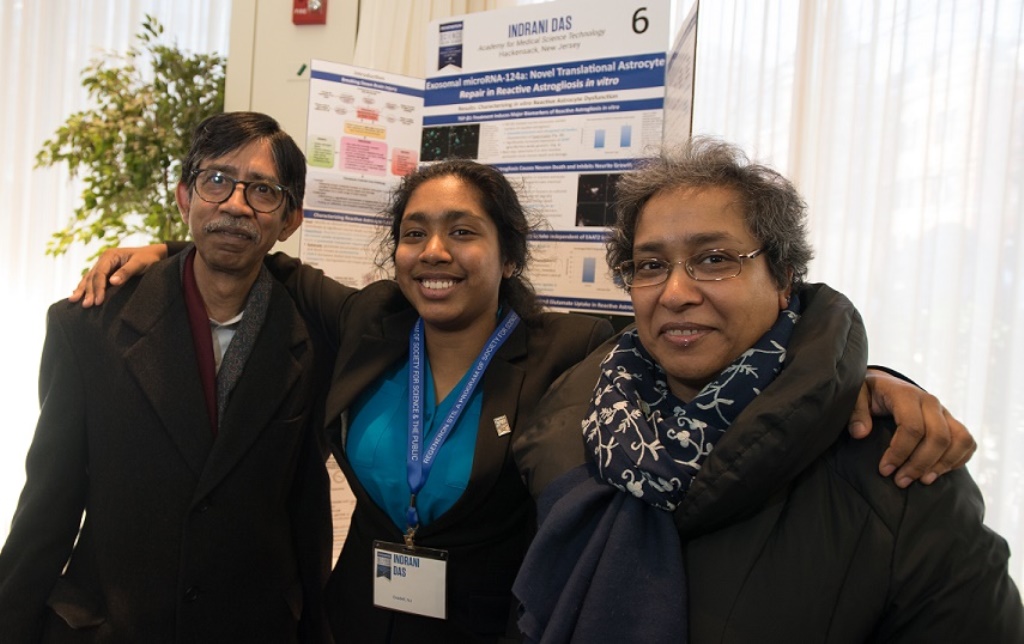 Indrani Das, the Indian-American teen who won the $250,000 Regeneron Science Talent Search prize, is flanked by her parents, Bidyut and Tanima Das. Credit: Society for Science & the Public/Via IANS