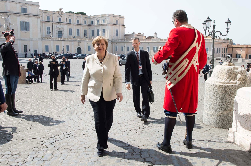 This handout picture released by the Italian Presidency (Quirinale) shows Germany's Chancellor Angela Merkel arriving, on March 25, 2017 at the Quirinale presidential palace before a meeting with Italian President as part of a special summit of European l