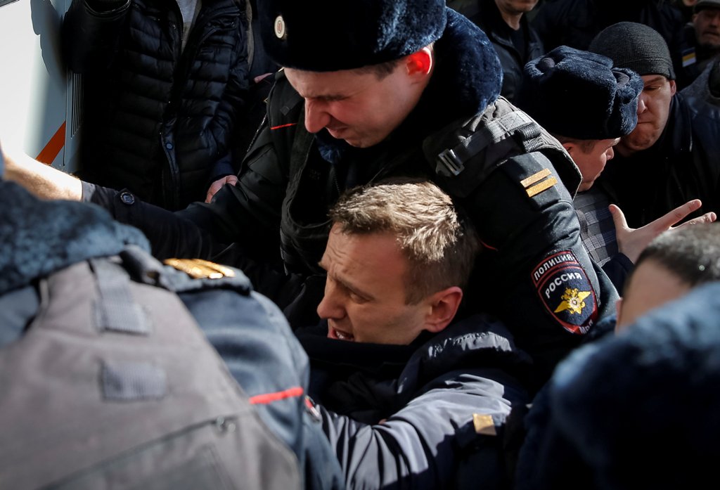 Police officers detain anti-corruption campaigner and opposition figure Alexei Navalny during a rally in Moscow, Russia, March 26, 2017. REUTERS/Maxim Shemetov
