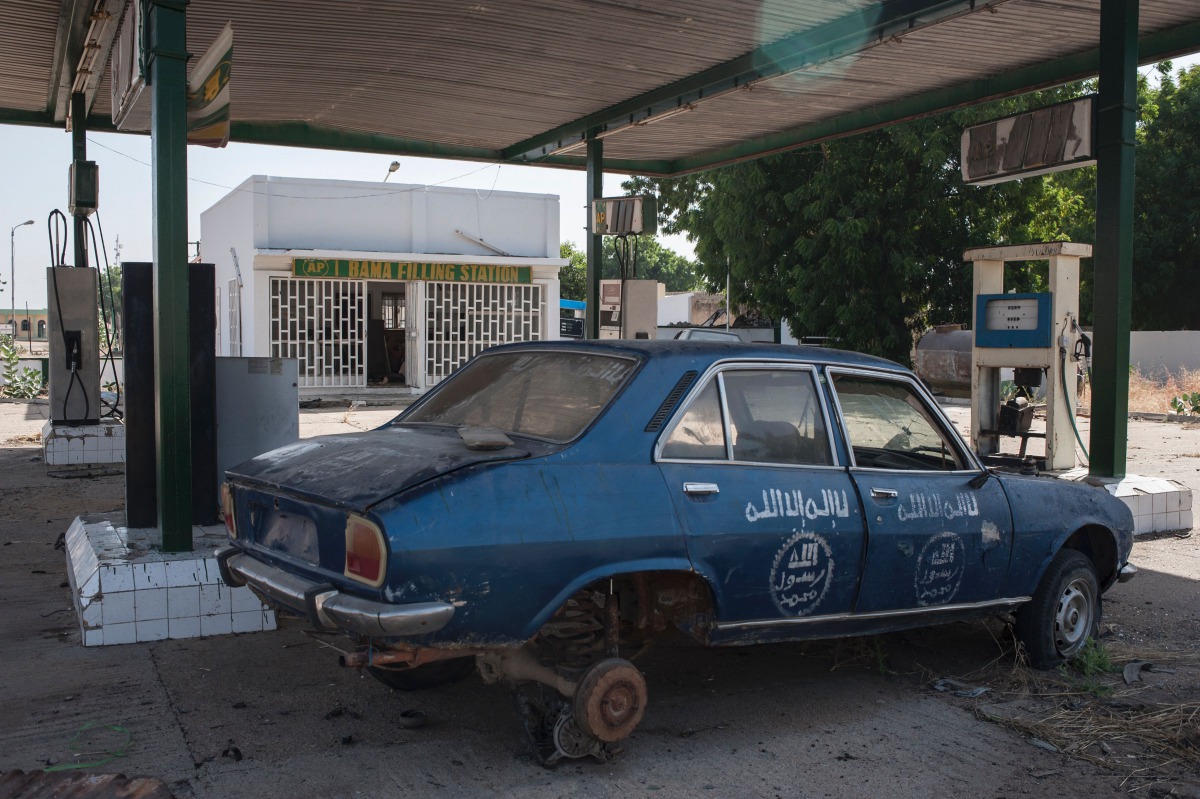 FILE PHOTO: A gas filling station destroyed by Boko Haram in Bama, in northeast Nigeria where a Boko Haram insurgency displaced more than 2 million people (AFP / STEFAN HEUNIS)