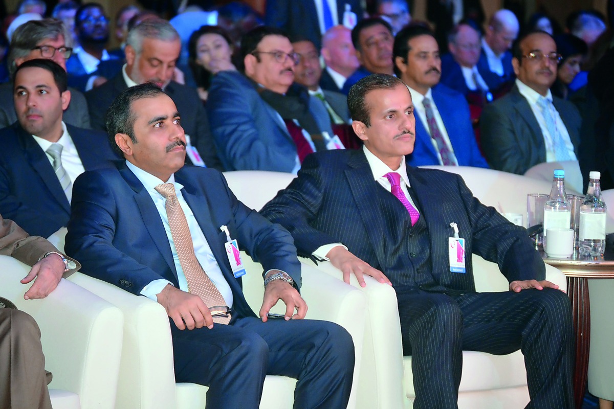 Sheikh Dr Khalid bin Thani bin Abdullah Al Thani (right, front row), Chairman of Ezdan Group Holding; Eng Essa bin Hilal Al Kuwari (left), President of Qatar General Electricity and Water Corporation (Kahramaa); and other officials at the Qatar-UK Busines