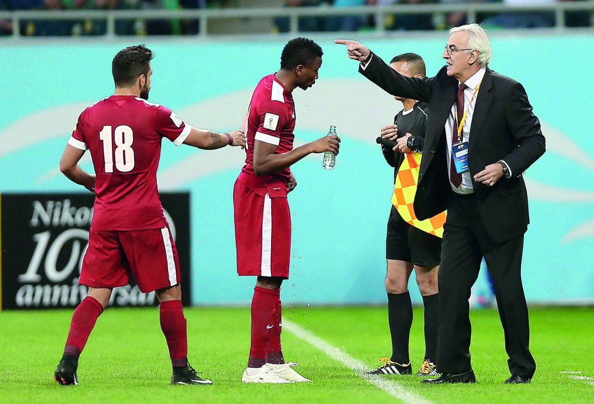 Qatar coach Jorge Fossati reacts during the game.