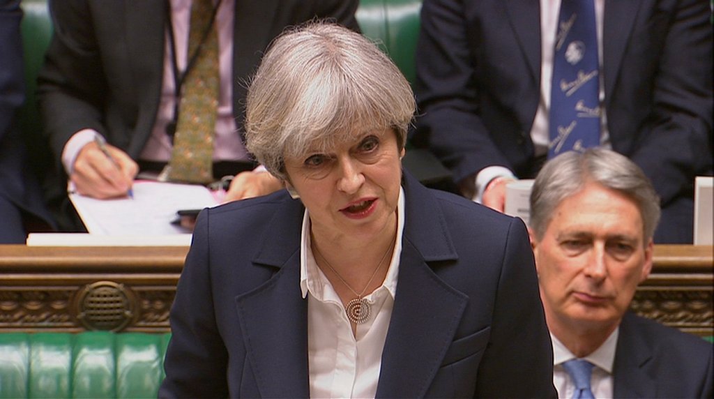 Britain's Prime Minister Theresa May speaks in Parliament as she announces that she has sent the letter to trigger the process of leaving the European Union in London, March 29, 2017.