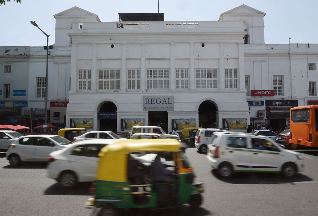 This picture taken on March 27, 2017 shows an exterior view of the Regal cinema, an 84-year-old movie hall, in the heart of the Indian capital New Delhi. AFP / Dominique Faget 
