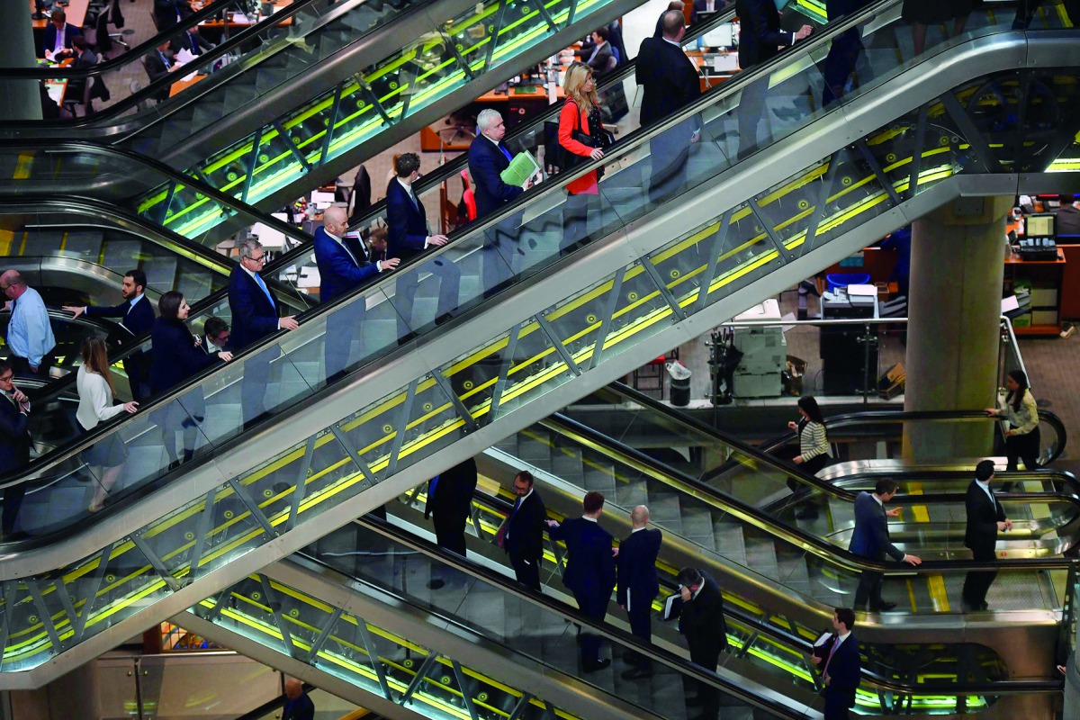 The interior of Lloyd's of London, the centuries-old insurance market, is pictured in the City of London yesterday. Lloyd's of London will open a Brussels subsidiary in early 2019, the historic insurance market said yesterday, the first company to respond