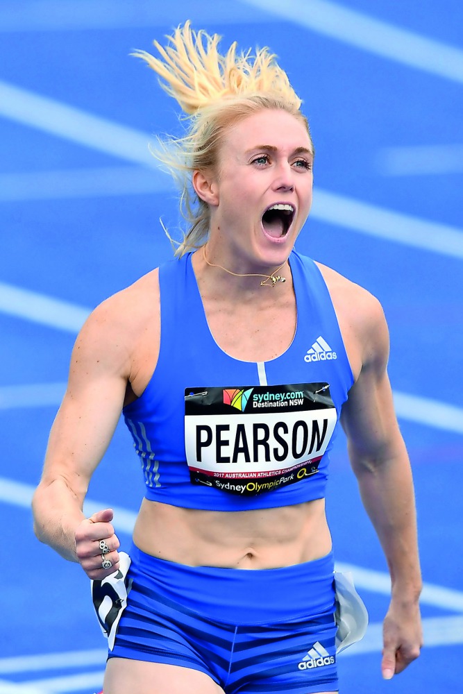 Australia's Sally Pearson celebrates after winning the women's 100 metres hurdles final in Sydney yesterday.