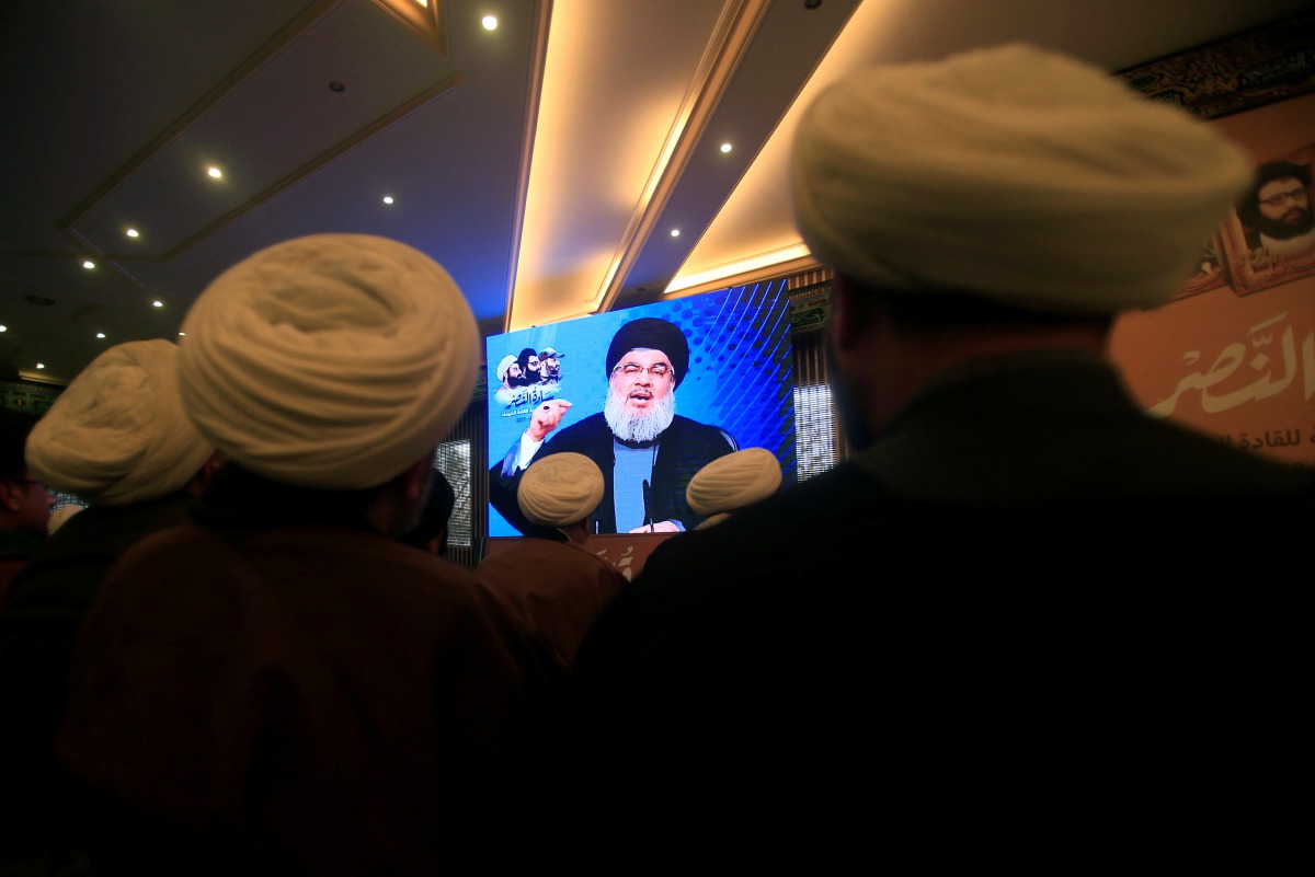 Hezbollah leader Sayyed Hassan Nasrallah addresses his supporters through a screen during a rally commemorating the annual Martyrs Leaders Day in Jebshit village, southern Lebanon, February 16, 2017.  (REUTERS) Iran's support for Lebanese Shiite movement 
