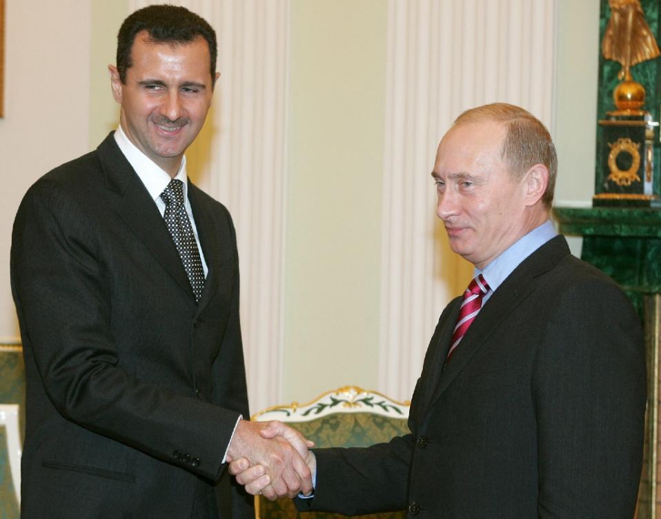 FILE PHOTO: Syrian President Bashar al-Assad with Russian President Vladimir Putin (AFP / Sergei Karpukhin) 