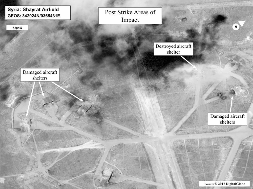This satellite photo courtesy of the Department of Defense shows a battle damage assessment image of Shayrat Airfield, Syria,following US Tomahawk Land Attack Missile strikes on April 7, 2017 from the USS Ross (DDG 71) and USS Porter (DDG 78), Arleigh Bur